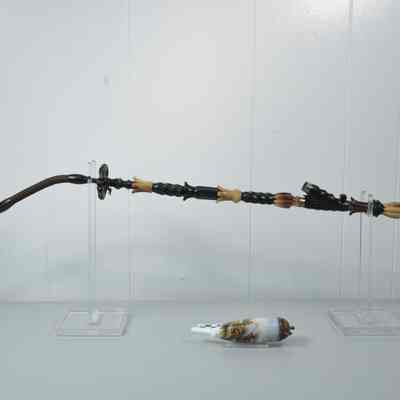 German pipe with white porcelain bowl and flexible stem