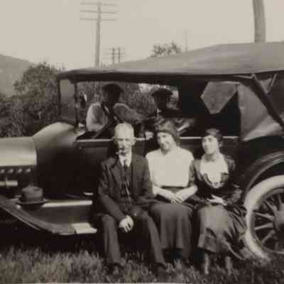 People posing on Car