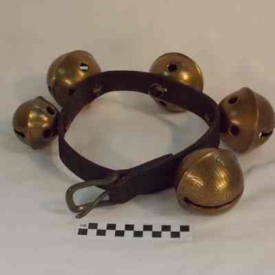 Five graduated brass sleigh bells
