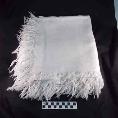 White linen tablecloth with fringe