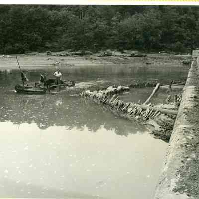Repairing hole in dam after 1942 flood ~ ARC734-1e