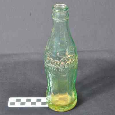 Clear green Coca-Cola bottle