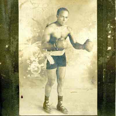 Unidentified African American man in boxing trunks