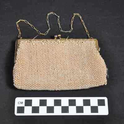 Small heavily beaded purse