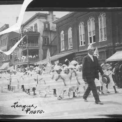 Children with flags in a parade