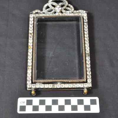 Glass and silver-tone easel-style metal picture frame