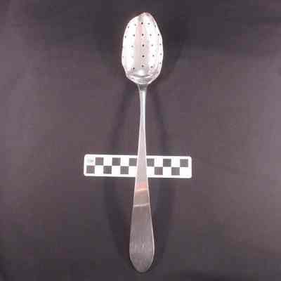 Coin silver spoon with holes