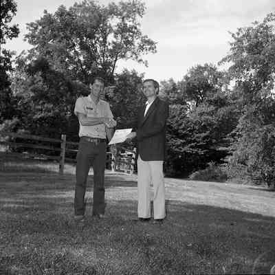Superintendent Donald W. Campbell presenting awards to park employees: Origformat: Other