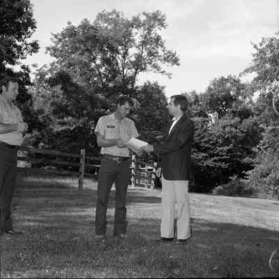Superintendent Donald W. Campbell presenting awards to park employees: Origformat: Other