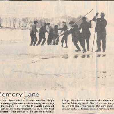 Individuals cutting away ice on Shenandoah River, 1917