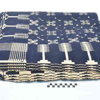 Indigo and beige coverlet