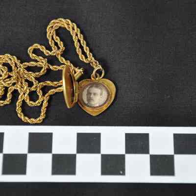 Gold locket with photo