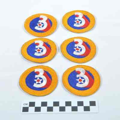 Six World War II Third Air Force shoulder patches