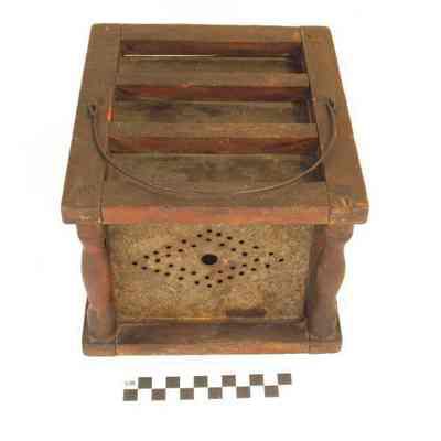 Tin and wood foot warmer