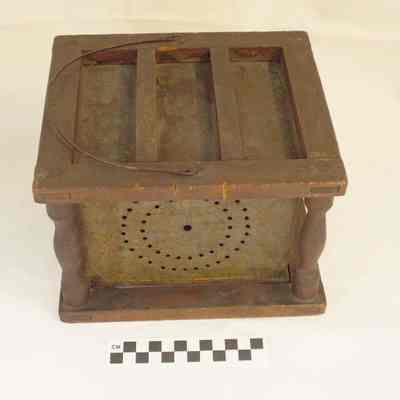 Tin and wood foot warmer