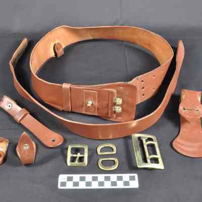 Brown leather belt with heavy brass buckle