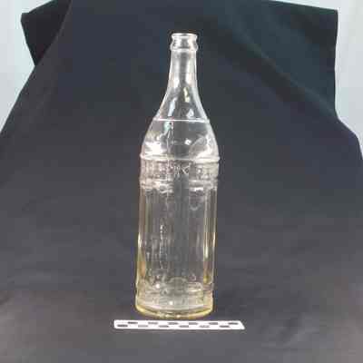 Clear glass beverage bottle