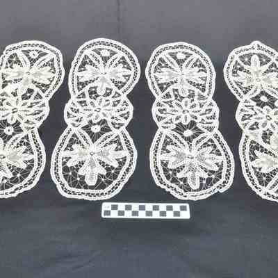 Four handmade doilies
