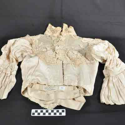 Cream colored satin blouse
