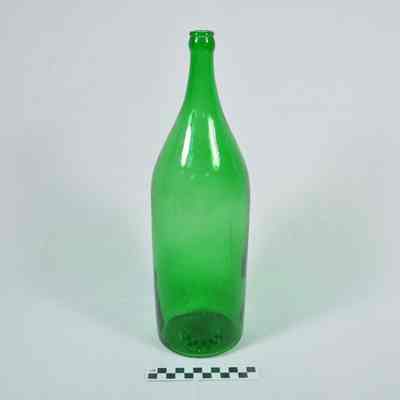 Large green glass beverage bottle