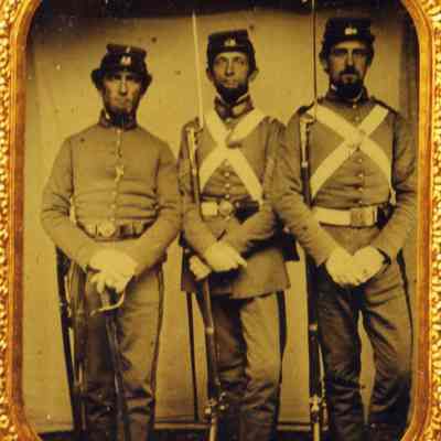 Three men in uniform