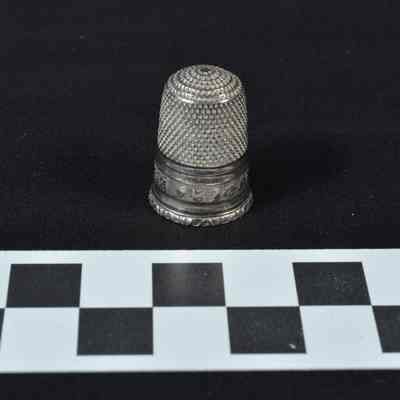 Thimble marked "FOR A FRIEND" in script