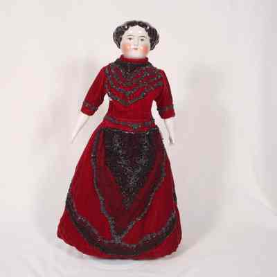 China doll with red velvet dress