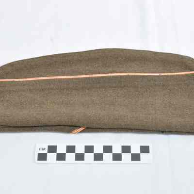 World War II uniform with Ike jacket, overseas or garrison cap and khaki trousers