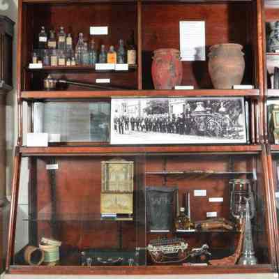 Two pharmacy cases one over top the other