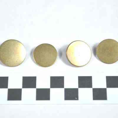 Four common Civil War brass uniform buttons