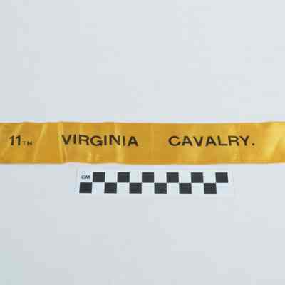 Yellow reunion ribbon marked "11th Virginia Cavalry"