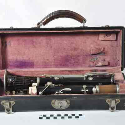 Wood and metal clarinet in case