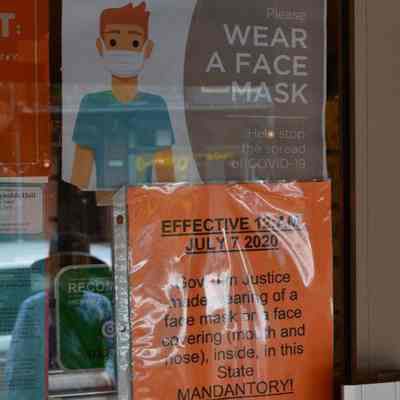 Pandemic signs at Dickinson & Wait Craft Gallery