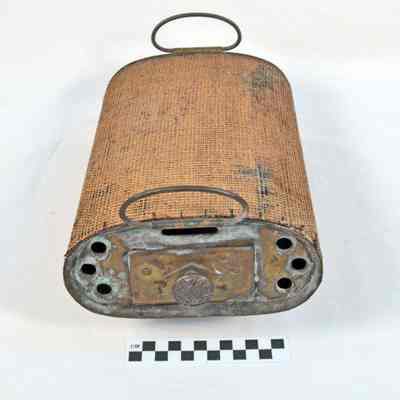 Oval shaped metal footwarmer