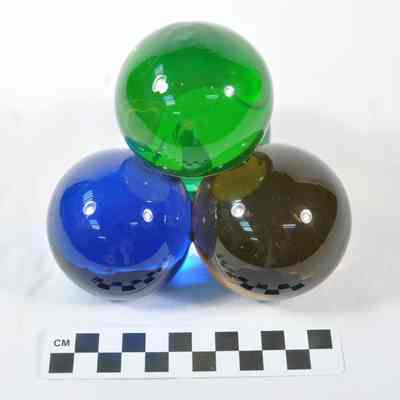 Colored glass paperweight
