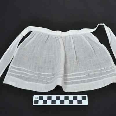 White cotton doll apron