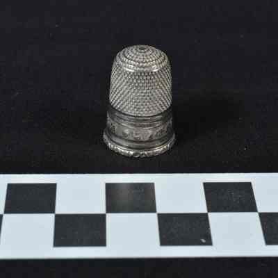 Thimble marked "FOR A FRIEND" in script