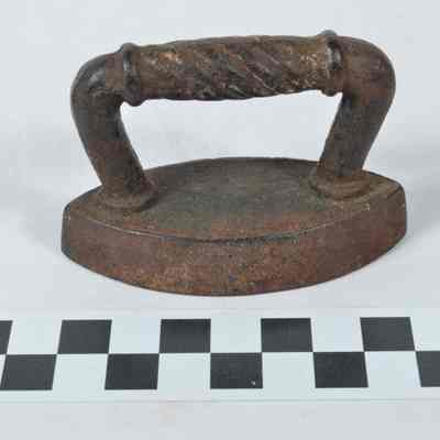 Miniature cast iron flat iron
