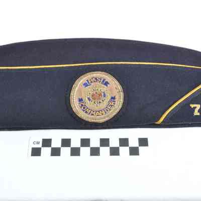Dark blue garrison cap with gold braid
