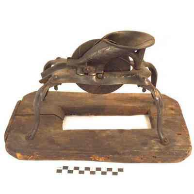 Cast iron cherry pitter