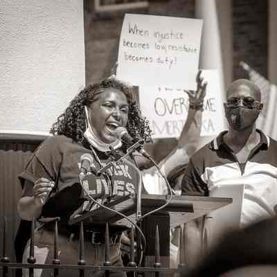 Women with mask speaking during Black Lives Matter rally (IMG3915013)