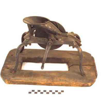 Cast iron cherry pitter