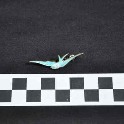 Pin in shape of a bird