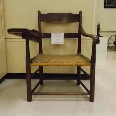 Writing chair with woven seat