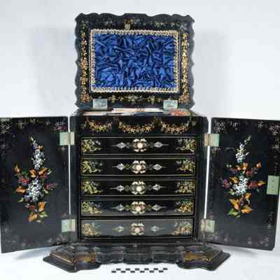 Multi-drawered,rectangular papier mache sewing cabinet