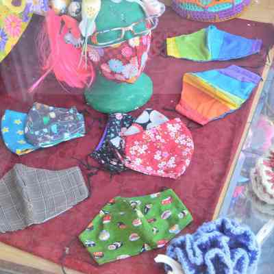 Store window mask display, East German Street, Shepherdstown