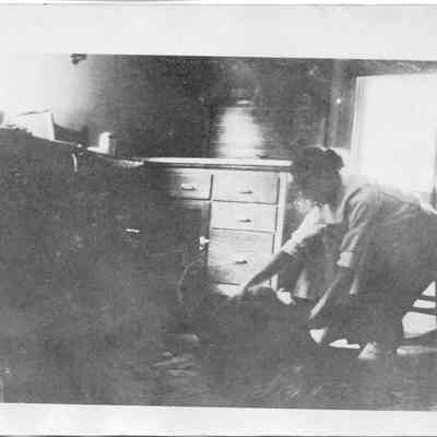 Carlotta Dice Gruber Milton in kitchen of Millville power plant  - 1920