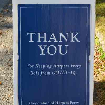 COVID-19 pandemic signs along Washington Street in Harpers Ferry