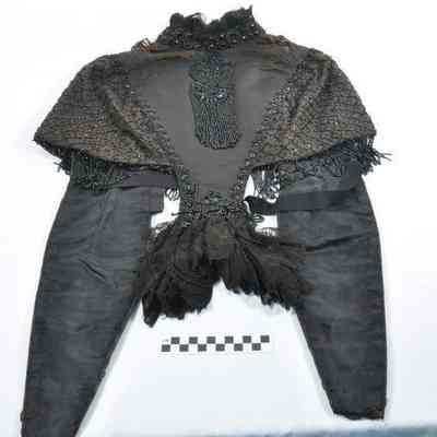 Black twill cape trimmed with lace and jet beads - back