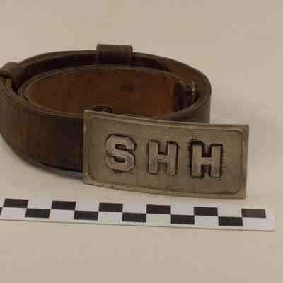 St. Hilda's Hall leather belt with silver colored buckle